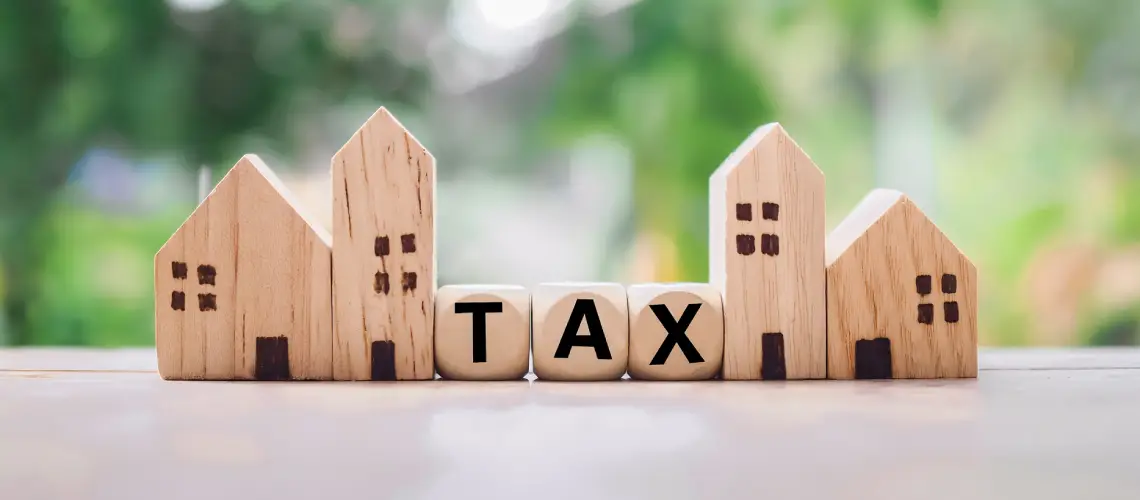 Certified property valuer assessing a house for tax valuation